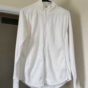 Womens zip up. 100% polyester. Super soft and comfy.